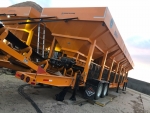 2 Olympus cold feed bins with discharge conveyors in extended position