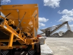 cold feed bins by Olympus a pavementgroup.com brand, shown with discharge conveyor on Florida damn project