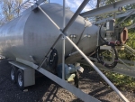 Silo 40ton, portable. Part of SludgePUG pugmill system by pavementgroup.com designed for liquid waste solidification by PavementGroup.com shown with sludge bin, incline screw, pugmill and silo, easily transportable shown with axles