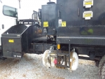 asphalt patch truck for sale, with waste asphalt bin  auger discharge and arrow board for sale from pavementgroup.com 2023