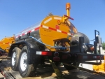 Asphalt Distributor Trailer and Trucks, STRATOS brand by Pavement Technologies Int'l Corp. Shown with 8' spraybar and 50' hose