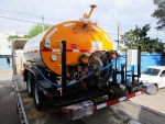 Tack Distributor STRATOS DMT-1000 by PavementGroup shown with 8' spray bar, 50' hose and applicator wand, No CDL required